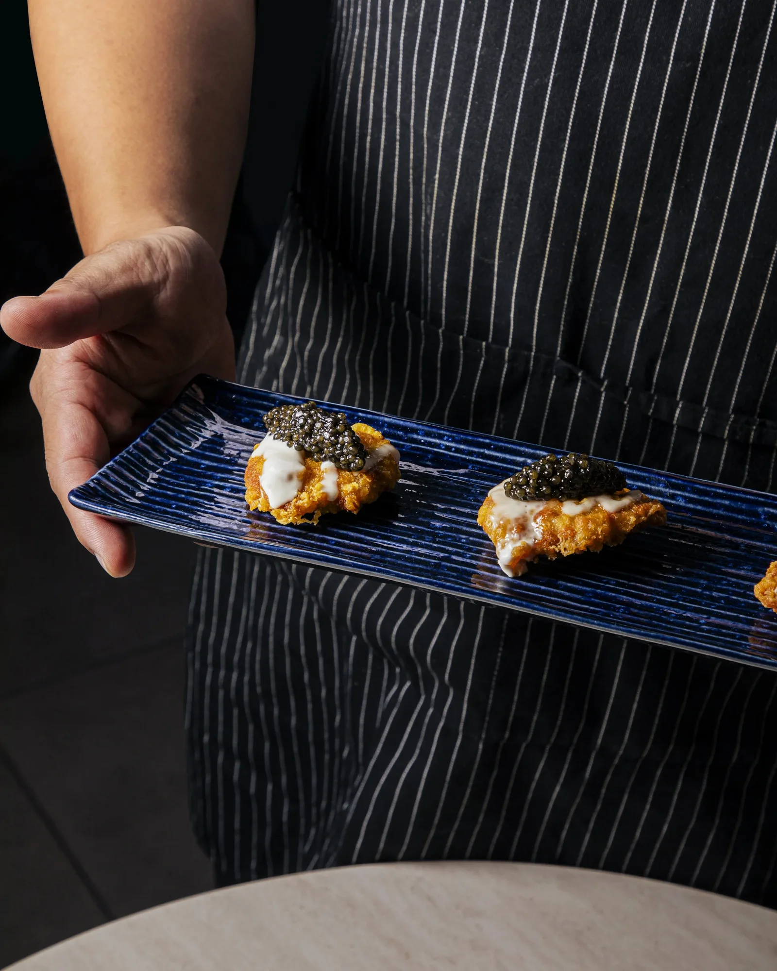 Chicken tempura topped with kaluga caviar